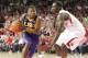 Feb 15, 2014; Fayetteville, AR, USA; Louisiana State Tigers guard Andre Stringer (10) drives against Arkansas Razorbacks forward Alandise Harris (2) at Bud Walton Arena. Arkansas defeated LSU 81-70. Mandatory Credit: Nelson Chenault-USA TODAY Sports