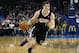 Sacramento Kings guard Jimmer Fredette (7) drives during an NBA basketball game against the Oklahoma City Thunder in Oklahoma City, Sunday, Jan. 19, 2014. Oklahoma City won 108-93.(AP Photo/Sue Ogrocki)