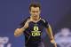 Texas A&M quarterback Johnny Manziel runs a drill at the NFL football scouting combine in Indianapolis, Sunday, Feb. 23, 2014. (AP Photo/Nam Y. Huh)