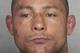 This booking photo released by the Broward County Sheriff's Office shows Ultimate Fighting Champion Thiago Silva. Silva, a mixed martial arts fighter, was being held in a Florida jail on Saturday, Feb. 8, 2014, accused of threatening his wife with a gun, authorities said. Broward County jail records show that Silva, 31, was being held without bond following his arrest Thursday on charges that included attempted murder, aggravated battery with a deadly weapon and obstruction without violence. But his attorney, Scott Saul, told The Associated Press that the charges were downgraded during a Friday court appearance to aggravated assault with a firearm and aggravated battery with a deadly weapon. (AP Photo/Broward County Sheriff's Office)