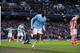 MANCHESTER, ENGLAND - FEBRUARY 22: Yaya Toure of Manchester City runs away to celebrate after scoring the winning goal during the Barclays Premier League match between Manchester City and Stoke City at the Etihad Stadium on February 22, 2014 in Manchester, England. (Photo by Clive Brunskill/Getty Images)