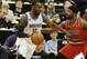 Feb 8, 2014; Minneapolis, MN, USA; Minnesota Timberwolves forward Shabazz Muhammad (15) moves to the basket around Portland Trail Blazers forward Dorell Wright (1) in the second quarter at Target Center. The Trail Blazers defeated the Wolves 117-110. Mandatory Credit: Marilyn Indahl-USA TODAY Sports