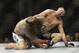 Hatsu Hioki, right, of Japan, fights Clay Guida during UFC Featherweight Championship on FOX 6 at the United Center in Chicago, Saturday, Jan. 26, 2013. Guida won the bout. (AP Photo/Nam Y. Huh)