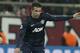 Manchester United's Robin Van Persie runs with the ball during a Champions League, round of 16, first leg soccer match against Olympiakos at Georgios Karaiskakis stadium, in Piraeus port, near Athens, on Tuesday, Feb. 25, 2014. (AP Photo/Petros Giannakouris)