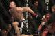 Wanderlei Silva, left, celebrates after beating Cung Le, right, during the second round of a UFC 139 Mixed Martial Arts middleweight bout in San Jose, Calif., Saturday, Nov. 19, 2011. Silva won by TKO in the second round. (AP Photo/Jeff Chiu)
