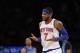 New York Knicks' Carmelo Anthony (7) reacts after hitting a 3-point shot against the Dallas Mavericks during the second half of an NBA basketball game Monday, Feb. 24, 2014, in New York. Dallas won 110-108. (AP Photo/Jason DeCrow)
