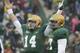 Baylor quarterback Bryce Petty (14) celebrates a play as teammate Kelvin Palmer (77) stands by during the first half of an NCAA college football game against Texas Saturday, Dec. 7, 2013, in Waco, Texas. (AP Photo/LM Otero)
