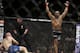 Daniel Cormier, right, reacts as the referee stops his UFC 170 mixed martial arts light heavyweight fight against Patrick Cummins on Saturday, Feb. 22, 2014, in Las Vegas. (AP Photo/Isaac Brekken)