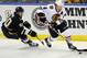 St. Louis Blues' Maxim Papierre (40) chases Chicago Blackhawks' Duncan Keith (2) during the second period of an NHL hockey game Saturday, Dec. 28, 2013, in St. Louis. (AP Photo/Bill Boyce)