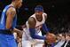 New York Knicks' Carmelo Anthony, right, works against Dallas Mavericks' Shawn Marion during the first half of an NBA basketball game Monday, Feb. 24, 2014, in New York. Dallas won 110-108. (AP Photo/Jason DeCrow)