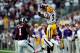 STARKVILLE, MS - OCTOBER 05: Odell Beckham Jr. #3 of the LSU Tigers goes up for a reception in front of Nickoe Whitley #1 of the Mississippi State Bulldogs during a game at Davis Wade Stadium on October 5, 2013 in Starkville, Mississippi. LSU won the game 59-26. (Photo by Stacy Revere/Getty Images)