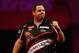 LONDON, ENGLAND - DECEMBER 28: Adrian Lewis of England celebrates winning a set during his third round match against Mervyn King of England on day thirteen of the Ladbrokes.com World Darts Championship at Alexandra Palace on December 28, 2013 in London, England. (Photo by Harry Engels/Getty Images)