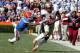 GAINESVILLE, FL - NOVEMBER 30: Kelvin Benjamin #1 of the Florida State Seminoles runs past Vernon Hargreaves III #1 of the Florida Gators during the game on November 30, 2013 in Gainesville, Florida. (Photo by Sam Greenwood/Getty Images)
