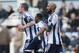 FILE - This Saturday Dec. 28, 2013 file photo shows West Bromwich Albion's Nicolas Anelka, right, as he gestures to celebrate his goal against West Ham United during their English Premier League soccer match at Upton Park, London. The English Football Association has banned Nicolas Anelka for five games after finding the West Bromwich Albion striker guilty of causing racial offense with a goal celebration deemed anti-Semitic. Anelka had denied that his use of the gesture, which is known in France as a