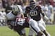 COLLEGE STATION, TX - OCTOBER 26: Darian Claiborne #48 of the Texas A&M Aggies lays a hard hit on Patton Robinette #4 of the Vanderbilt Commodores at Kyle Field on October 26, 2013 in College Station, Texas. (Photo by Bob Levey/Getty Images)