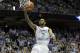 North Carolina's Leslie McDonald (2) drives to the basket against North Carolina State during the first half of an NCAA college basketball game in Chapel Hill, N.C., Saturday, Feb. 1, 2014. (AP Photo/Gerry Broome)