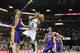 Memphis Grizzlies forward James Johnson (3) goes to the basket against Los Angeles Lakers defenders Pau Gasol, left, Wesley Johnson (11) and Jordan Farmar (1) in the second half of an NBA basketball game, Wednesday, Feb. 26, 2014, in Memphis, Tenn. The Grizzlies won 108-103. (AP Photo/Lance Murphey)
