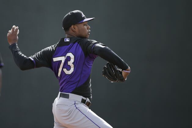 Rockies' Aquino Hit in Head by Liner, Walks off