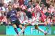 STOKE ON TRENT, ENGLAND - AUGUST 26: Mikel Arteta of Arsenal passes the ball past Peter Crouch during the Barclays Premier League match between Stoke City and Arsenal at the Britannia Stadium on August 26, 2012 in Stoke on Trent, England. (Photo by David Rogers/Getty Images)