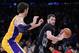Dec 20, 2013; Los Angeles, CA, USA; Los Angeles Lakers center Pau Gasol (16) guards Minnesota Timberwolves power forward Kevin Love (42) during the first half of the game at Staples Center. Mandatory Credit: Jayne Kamin-Oncea-USA TODAY Sports