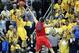 Feb 1, 2014; Berkeley, CA, USA; California Golden Bears guard Justin Cobbs (1) shoots the game winning shot against Arizona Wildcats center Kaleb Tarczewski (35) during the second half at Haas Pavilion. The California Golden Bears defeated the Arizona Wildcats 60-58. Mandatory Credit: Kelley L Cox-USA TODAY Sports