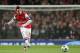 Arsenal's Santi Cazorla passes the ball forward during a Champions League, round of 16, first leg soccer match between Arsenal and Bayern Munich at the Emirates stadium in London, Wednesday, Feb. 19, 2014 .(AP Photo/Alastair Grant)