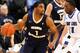 Feb 22, 2014; St. Louis, MO, USA; George Washington Colonials guard Maurice Creek (1) moves to the basket past Saint Louis Billikens guard Mike McCall Jr. (11) during the second half at Chaifetz Arena. Mandatory Credit: Scott Kane-USA TODAY Sports