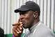 KILDARE, IRELAND - SEPTEMBER 22: Michael Jordan smokes a cigar and watches the action during the morning fourballs of the first day of the 2006 Ryder Cup at The K Club on September 22, 2006 in Straffan, Co. Kildare, Ireland. (Photo by Ross Kinnaird/Getty Images)