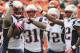 New England Patriots cornerback Aqib Talib (31) celebrates against the Cincinnati Bengals in an NFL football game, Sunday, Oct. 6, 2013, in Cincinnati. (AP Photo/Tom Uhlman)