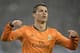 Real's Cristiano Ronaldo reacts after scoring during a Champions League round of sixteen, first leg soccer match between Schalke 04 and Real Madrid at the Veltins Arena in Gelsenkirchen, Germany, Wednesday Feb. 26, 2014. (AP Photo/Martin Meissner)