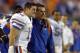 Florida quarterback Tim Tebow, left, head coach Urban Meyer celebrate in the fourth quarter against Georgia during an NCAA college football game, Saturday, Nov. 1, 2008 in Jacksonville, Fla. Florida beat Georgia 49-10. (AP Photo/Stephen Morton)
