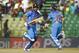 India’s Virat Kohli, left, and Shikhar Dhawan run between the wickets during the Asia Cup one-day international cricket tournament against Sri Lanka in Fatullah, near Dhaka, Bangladesh, Friday, Feb. 28, 2014. (AP Photo/A.M. Ahad)