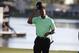 Tiger Woods walks off the 18th green after completing the second round of the Honda Classic golf tournament, Friday, Feb. 28, 2014, in Palm Beach Gardens, Fla. (AP Photo/Lynne Sladky)