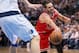 Feb 28, 2014; Dallas, TX, USA; Chicago Bulls center Joakim Noah (13) passes the ball past Dallas Mavericks power forward Dirk Nowitzki (41) during the second half at the American Airlines Center. The Bulls defeated the Mavericks 100-91. Mandatory Credit: Jerome Miron-USA TODAY Sports