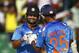 India’s Virat Kohli, left, celebrates with Shikhar Dhawan who scored a boundary during the Asia Cup one-day international cricket tournament against Sri Lanka in Fatullah, near Dhaka, Bangladesh, Friday, Feb. 28, 2014. (AP Photo/A.M. Ahad)