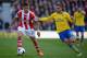 STOKE ON TRENT, ENGLAND - MARCH 01: Lukas Podolski of Arsenal competes with Geoff Cameron of Stoke City during the Barclays Pemier League match between Stoke City and Arsenal at the Britannia Stadium on March 1, 2014 in Stoke on Trent, England. (Photo by Michael Regan/Getty Images)