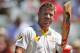 Australian David Warner, holds up his bat after making over a hundred run's during the opening day of the third cricket test match against South Africa in Cape Town, South Africa, Saturday, March 1, 2014. (AP Photo/Schalk van Zuydam)