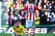 STOKE ON TRENT, ENGLAND - MARCH 01: Olivier Giroud of Arsenal argues with Charlie Adam of Stoke City during the Barclays Premier League match between Stoke City and Arsenal at Britannia Stadium on March 1, 2014 in Stoke on Trent, England. (Photo by Laurence Griffiths/Getty Images)