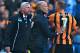 HULL, ENGLAND - MARCH 01: Fourth official Howard Webb restrains David Meyler of Hull City (7) after a clash with Alan Pardew manager of Newcastle United (L) during the Barclays Premier League match between Hull City and Newcastle United at KC Stadium on March 1, 2014 in Hull, England. (Photo by Matthew Lewis/Getty Images)