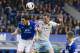 Everton's Gareth Barry, left, fights for the ball against West Ham United's Kevin Nolan during their English Premier League soccer match at Goodison Park Stadium, Liverpool, England, Saturday March 1, 2014. (AP Photo/Jon Super)