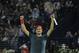 Roger Federer of Switzerland celebrates after beating Tomas Berdych of Czech Republic during the final match of the Dubai Duty Free Tennis Championships in Dubai, United Arab Emirates, Saturday, March 1, 2014. (AP Photo/Kamran Jebreili)