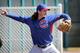 Chicago Cubs pitcher Jeff Samardzija throws during the team's first spring training baseball practice, Friday, Feb. 14, 2014, in Mesa, Ariz. (AP Photo/Matt York)