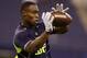 Oregon State wide receiver Brandin Cooks makes a catch as he runs a drill at the NFL football scouting combine in Indianapolis, Sunday, Feb. 23, 2014. (AP Photo/Michael Conroy)