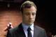 FILE - In this Monday, Aug. 19, 2013 file photo, double-amputee Olympian Oscar Pistorius appears at the magistrates court to be indicted on charges of murder and illegal possession of ammunition for the shooting death of his girlfriend on Valentine's Day in Pretoria, South Africa. A South Africa judge ruled Tuesday that television stations can broadcast parts of Oscar Pistorius' murder trial live, but with restrictions on witness testimonies. (AP Photo/Themba Hadebe, File)