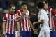 Atletico's Diego Costa, 2nd left has words with Real's Pepe, 3rd right during a semi final, 1st leg, Copa del Rey soccer derby match between Real Madrid and Atletico Madrid at the Santiago Bernabeu Stadium in Madrid, Wednesday Feb. 5, 2014. (AP Photo/Paul White)