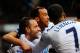 LONDON, ENGLAND - MARCH 02: Roberto Soldado of Tottenham Hotspur celebrates scoring the opening goal with Andros Townsend and Aaron Lennon of Tottenham Hotspur during the Barclays Premier League match between Tottenham Hotspur and Cardiff City at White Hart Lane on March 2, 2014 in London, England. (Photo by Mike Hewitt/Getty Images)