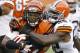 Cincinnati Bengals running back BenJarvus Green-Ellis, left, is tackled by Cleveland Browns inside linebacker D'Qwell Jackson, right, during the first half of an NFL football game, Sunday, Nov. 17, 2013, in Cincinnati. (AP Photo/David Kohl)