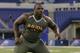 Auburn offensive lineman Greg Robinson runs a drill at the NFL football scouting combine in Indianapolis, Saturday, Feb. 22, 2014. (AP Photo/Michael Conroy)