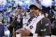 Seattle Seahawks' quarterback Russell Wilson holds the Lombardi Trophy after the NFL Super Bowl XLVIII football game Sunday, Feb. 2, 2014, in East Rutherford, N.J. The Seahawks won 43-8. (AP Photo/Julio Cortez)