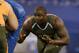 Auburn offensive lineman Greg Robinson runs a drill at the NFL football scouting combine in Indianapolis, Saturday, Feb. 22, 2014. (AP Photo/Michael Conroy)